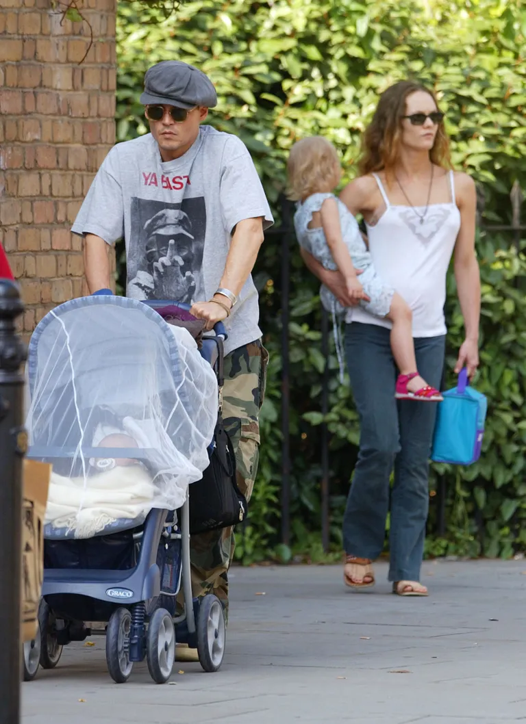 Johnny Depp and Vanessa Paradis spotted out with both their kids in London, England in 2012. | Source: Getty Images