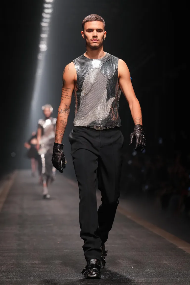 Romeo Beckham walks the runway at the Versace fashion show during the Milan Fashion Week on February 28, 2025, in Milan, Italy. | Source: Getty Images