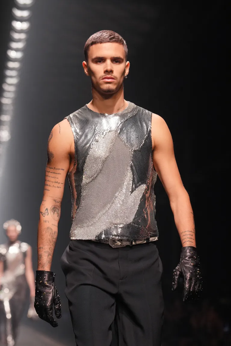 Romeo Beckham walks the runway at the Versace fashion show during the Milan Fashion Week on February 28, 2025, in Milan, Italy. | Source: Getty Images