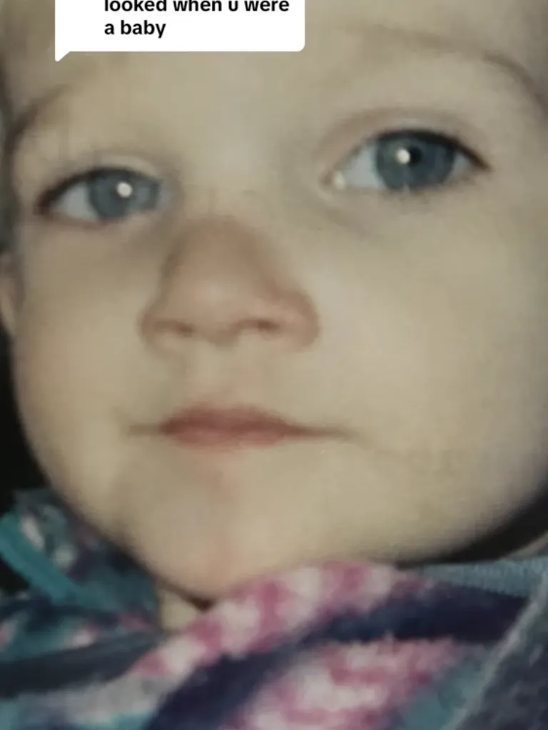 Devyn Aiken as a toddler, captured in a close-up that shows the early shape of the nose she later chose to change. | Source: Tiktok/doseofdevy