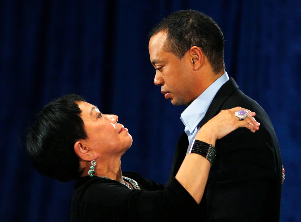 Tiger Woods and his mom Kultida Woods sharing a moment at TPC Sawgrass on February 19, 2010. | Source: Getty Images